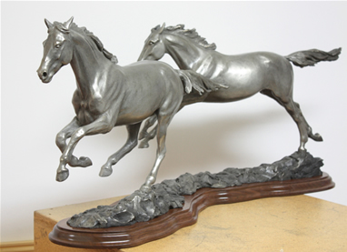 Bronze horses galloping, Running Free